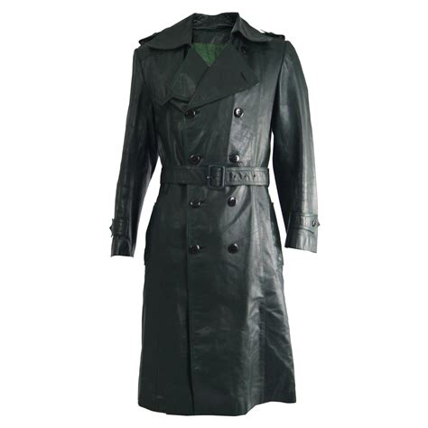 Shiny leather trench coat in dark green 